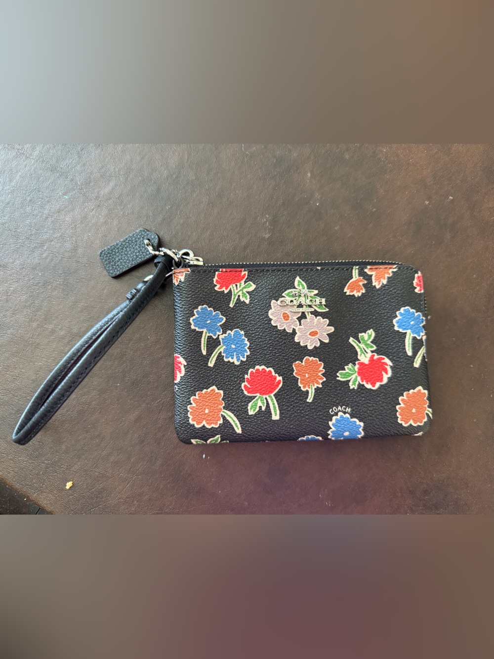 Coach Black Floral Zip Wristlet with Red, Blue, Orange Accents